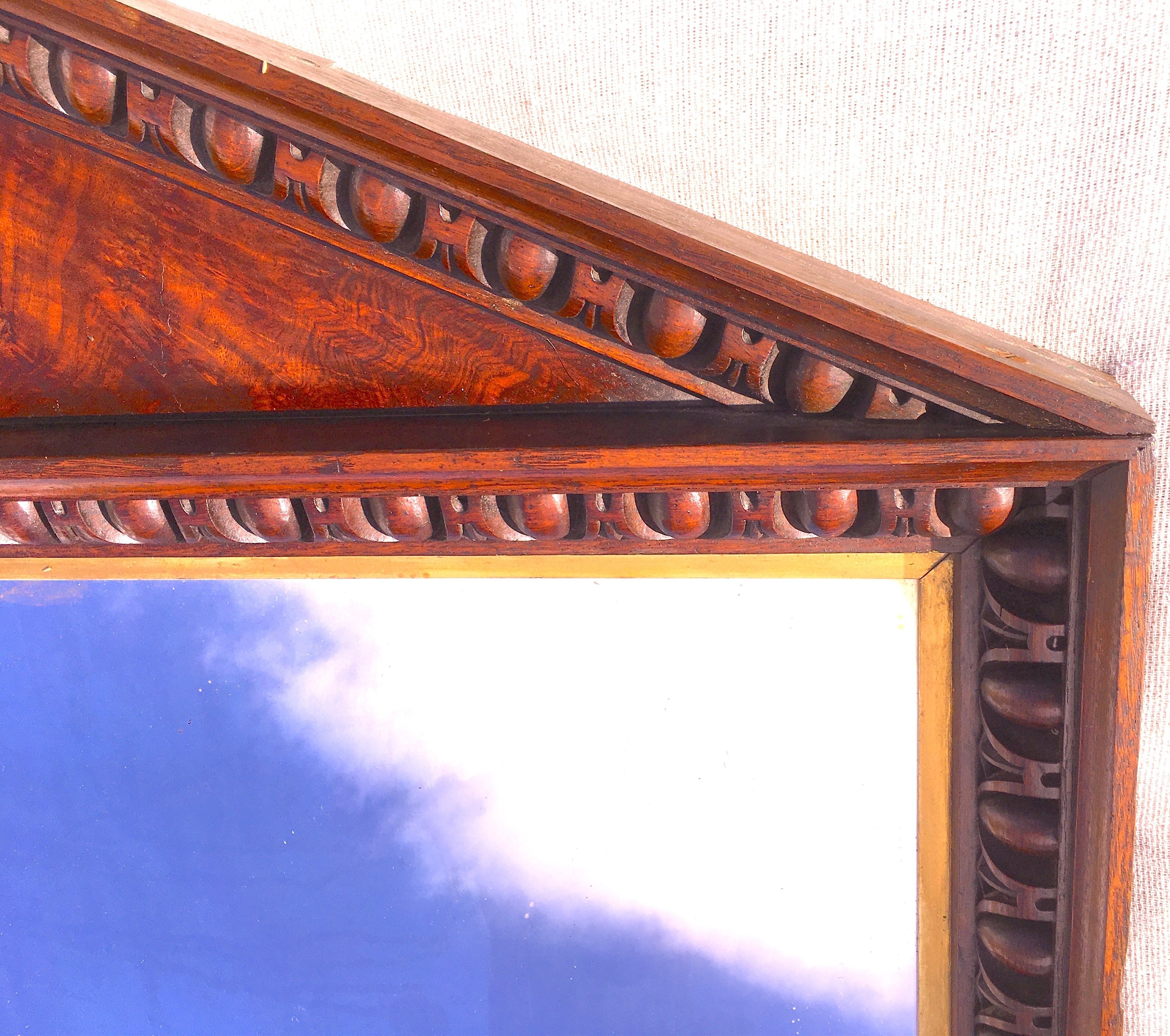 A George IV oak and pollard oak arched overmantel mirror with gilt slip, width 96cm, height 136cm
